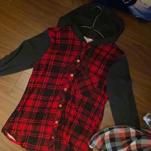 Red shirt with hood. Never been worn size s